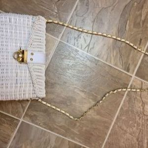 White plastic wicker looking woven bag